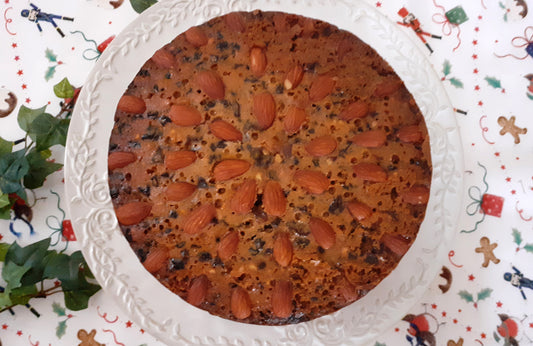 Christmas cake on a festive table runner