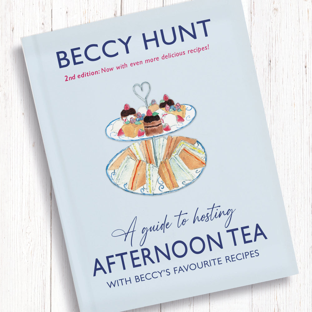 Cover of “A Guide to Hosting Afternoon Tea” 2nd Edition by Beccy Hunt – signed cookbook featuring traditional British recipes, tea party ideas, and homemade bakes.