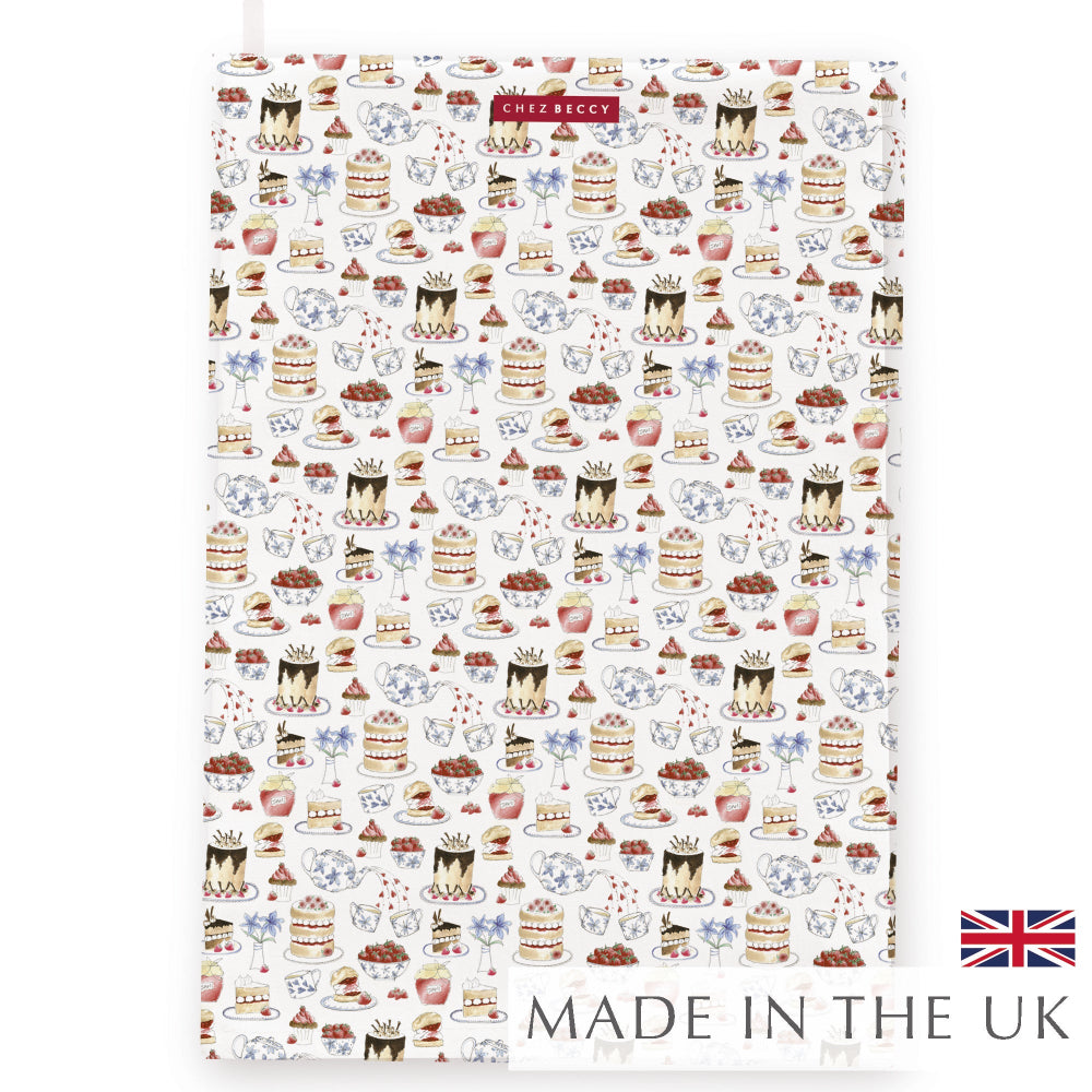 Afternoon Tea Towel showcasing hand-painted illustrations of cakes, teacups, and teapots on 100% half panama cotton fabric. Designed and made in the UK.