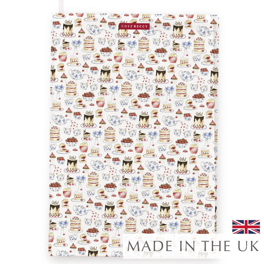 Afternoon Tea Towel showcasing hand-painted illustrations of cakes, teacups, and teapots on 100% half panama cotton fabric. Designed and made in the UK.