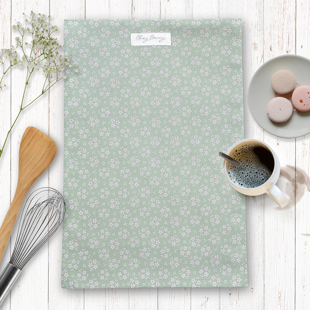 Chez Beccy Sage Green Ditsy Floral Tea Towel in 100% half panama cotton, featuring a delicate floral design, perfect for kitchen use.