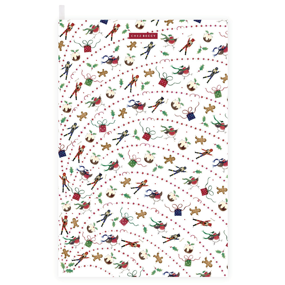 Christmas icons flying around on a tea towel