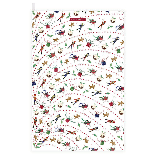 Christmas icons flying around on a tea towel