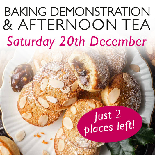A promotional image for a baking demonstration and afternoon tea event on Saturday, 13th December. The image features delicious mince pies, topped with frangipane. The text is styled in a mix of elegant black and festive pink fonts.