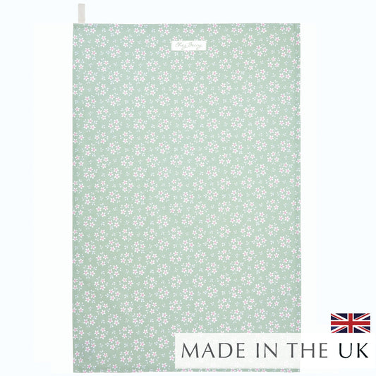 Chez Beccy Sage Green Ditsy Floral Tea Towel in 100% half panama cotton, featuring a delicate floral design, perfect for kitchen use.