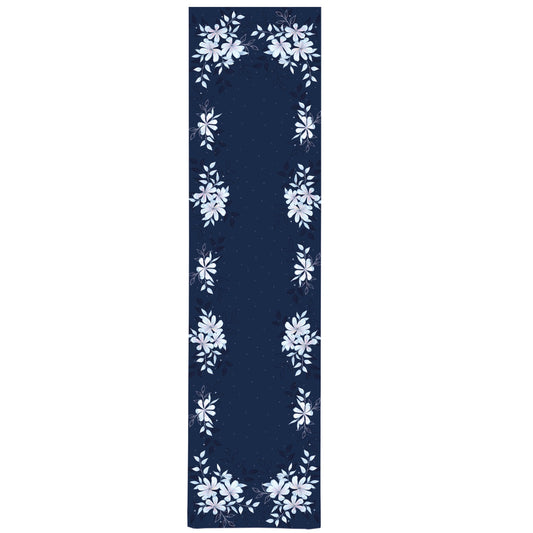 A navy blue table runner with a floral pattern, featuring small white flowers and leaves.