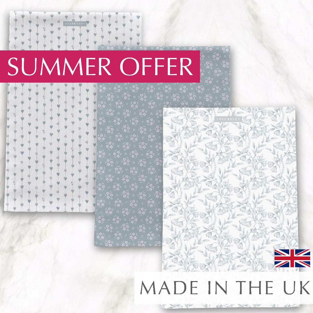Set of three grey tea towels with hearts and roses, ditsy floral, and damask floral designs, made from premium 100% half panama cotton