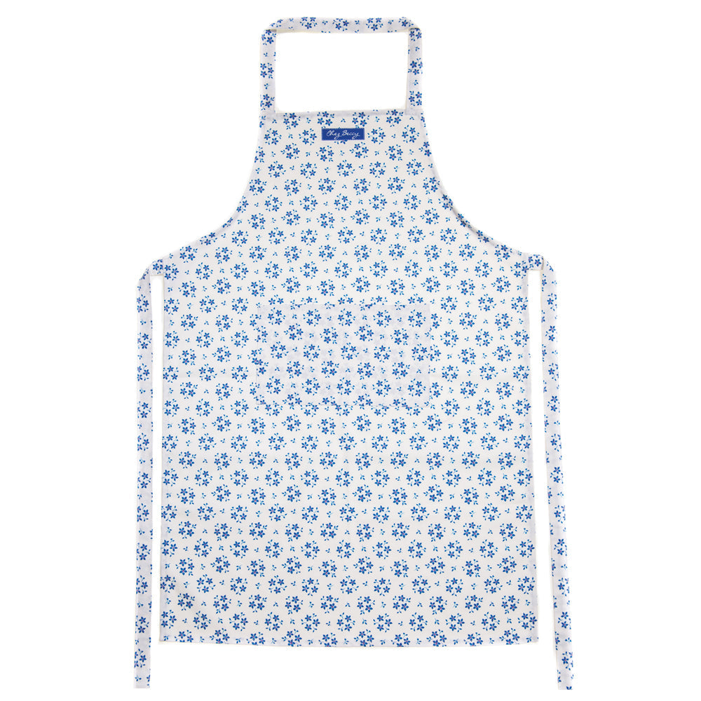 Blue Ditsy Floral Apron with hand-drawn forget-me-not floral design, made from 100% half panama cotton with front pocket and extra-long ties