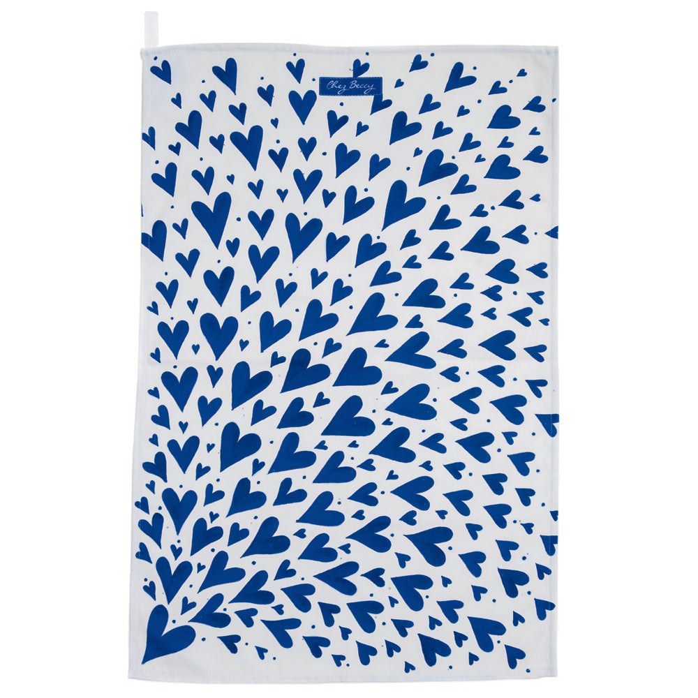 Blue Shooting Heart Tea Towel featuring a hand-painted design of blue hearts on 100% half panama cotton fabric, measuring approximately 70 cm by 47 cm. Designed and made in the UK.