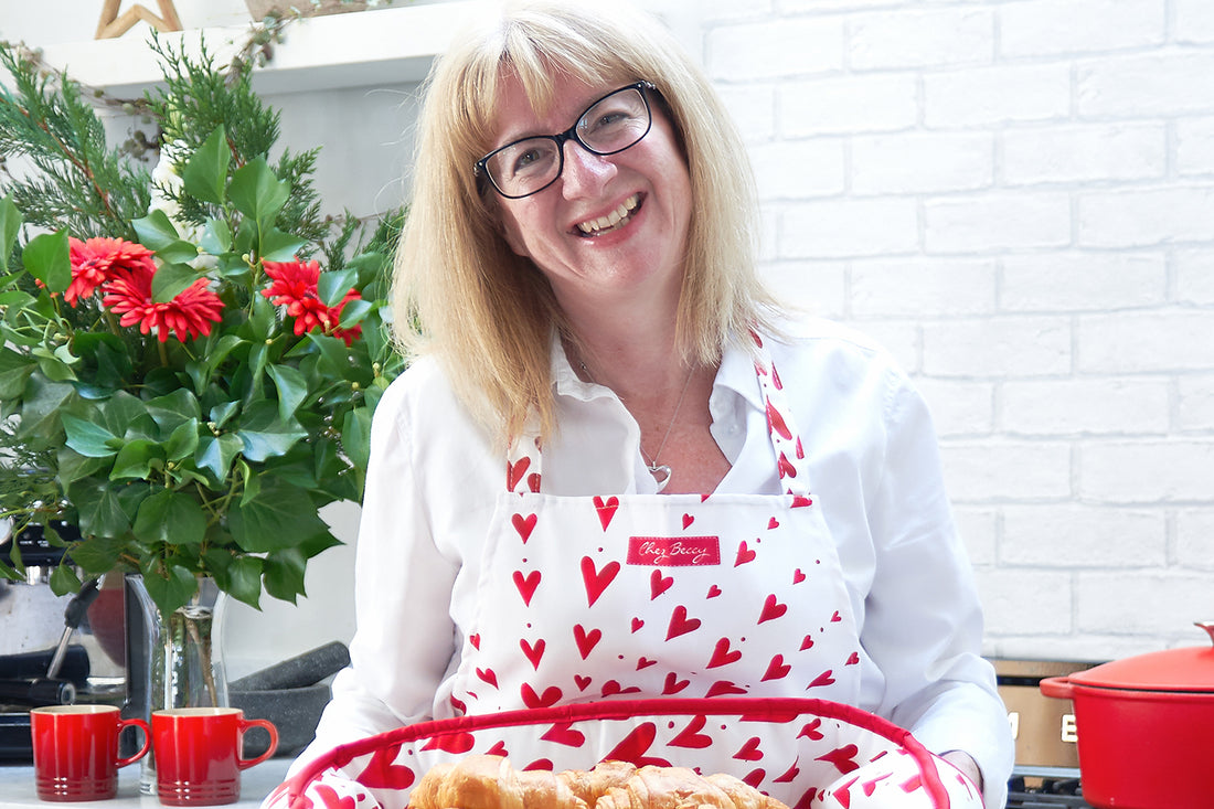 Chez Beccy, Chez Beccy apron, red heart apron, red shooting heart apron, red apron, sustainable homeware, kitchen linens, kitchen textiles, made in Britain, joy in every day moments, joy in every day tasks