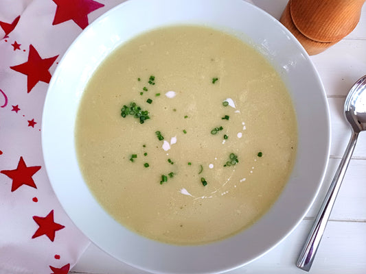 Curried parsnip soup on a red star tea towel