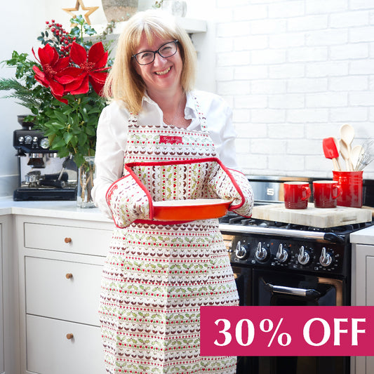 Christmas apron with Christmas pudding, holly and heart icons