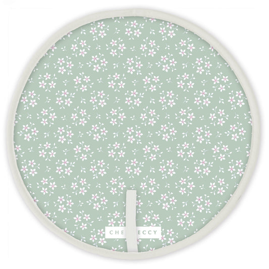 Green ditsy floral Aga circular hob cover with cream piping, 38cm diameter, made from cotton
